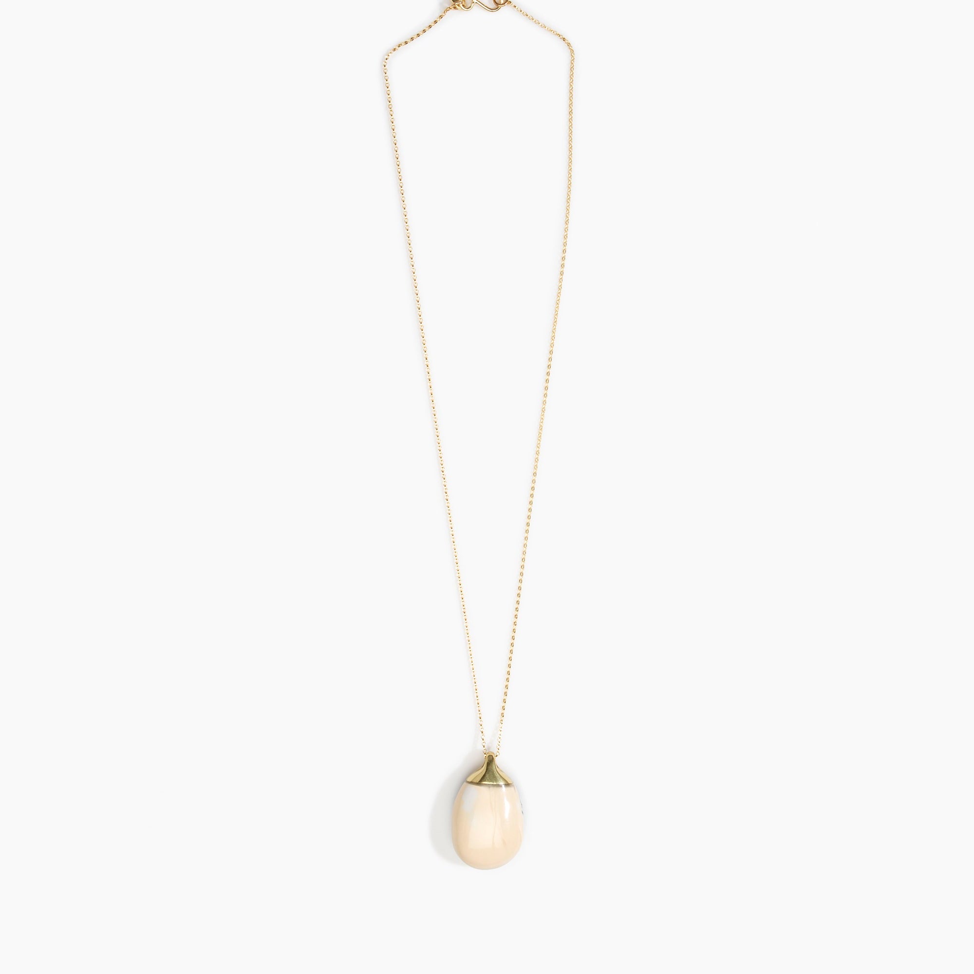 Dinosaur Designs Medium River Rock Pendant in Sandy Pearl Colour resin with Gold-Filled Material.