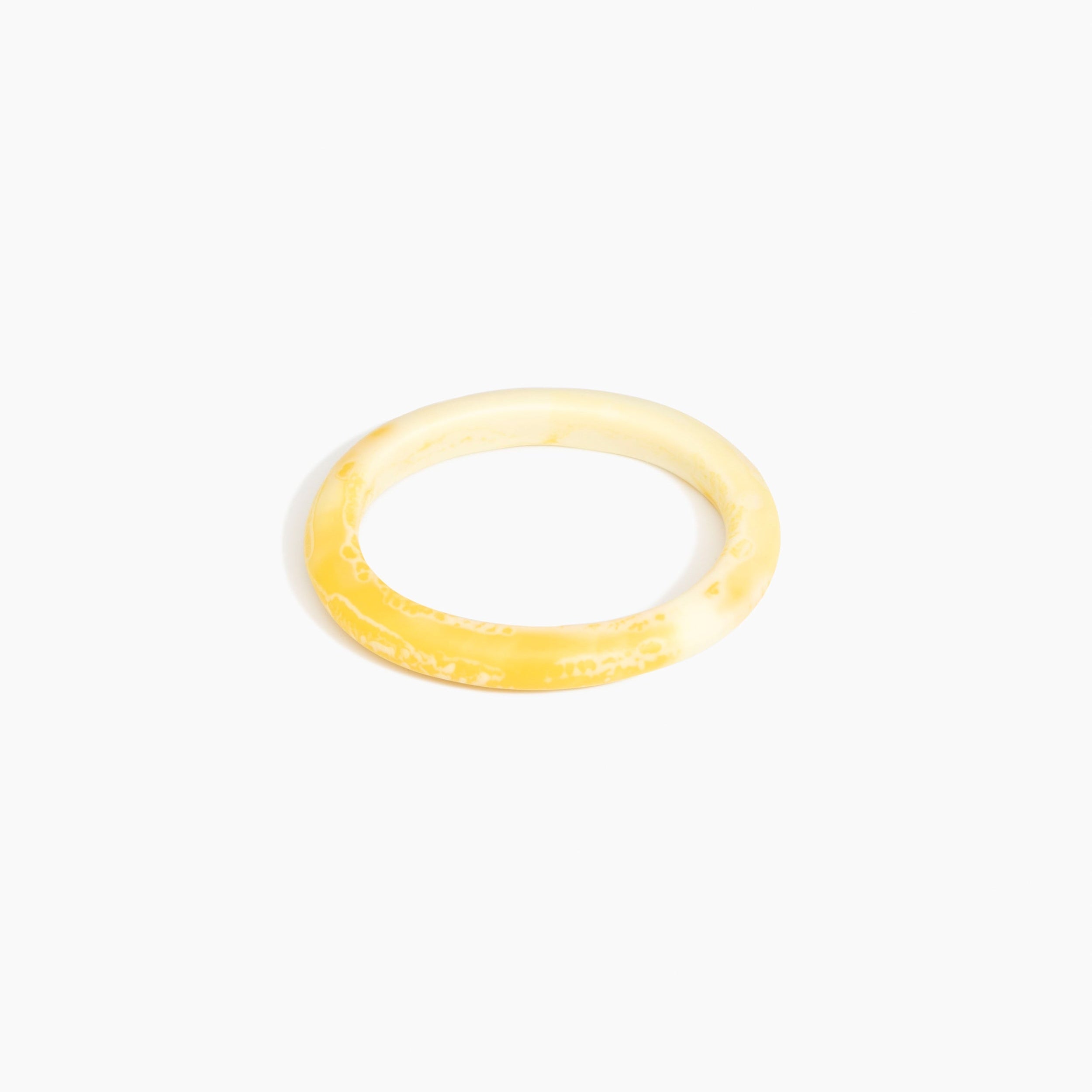 Dinosaur Designs Small Organic Oval Bangle in Daisy Colour resin with Wide Fit.