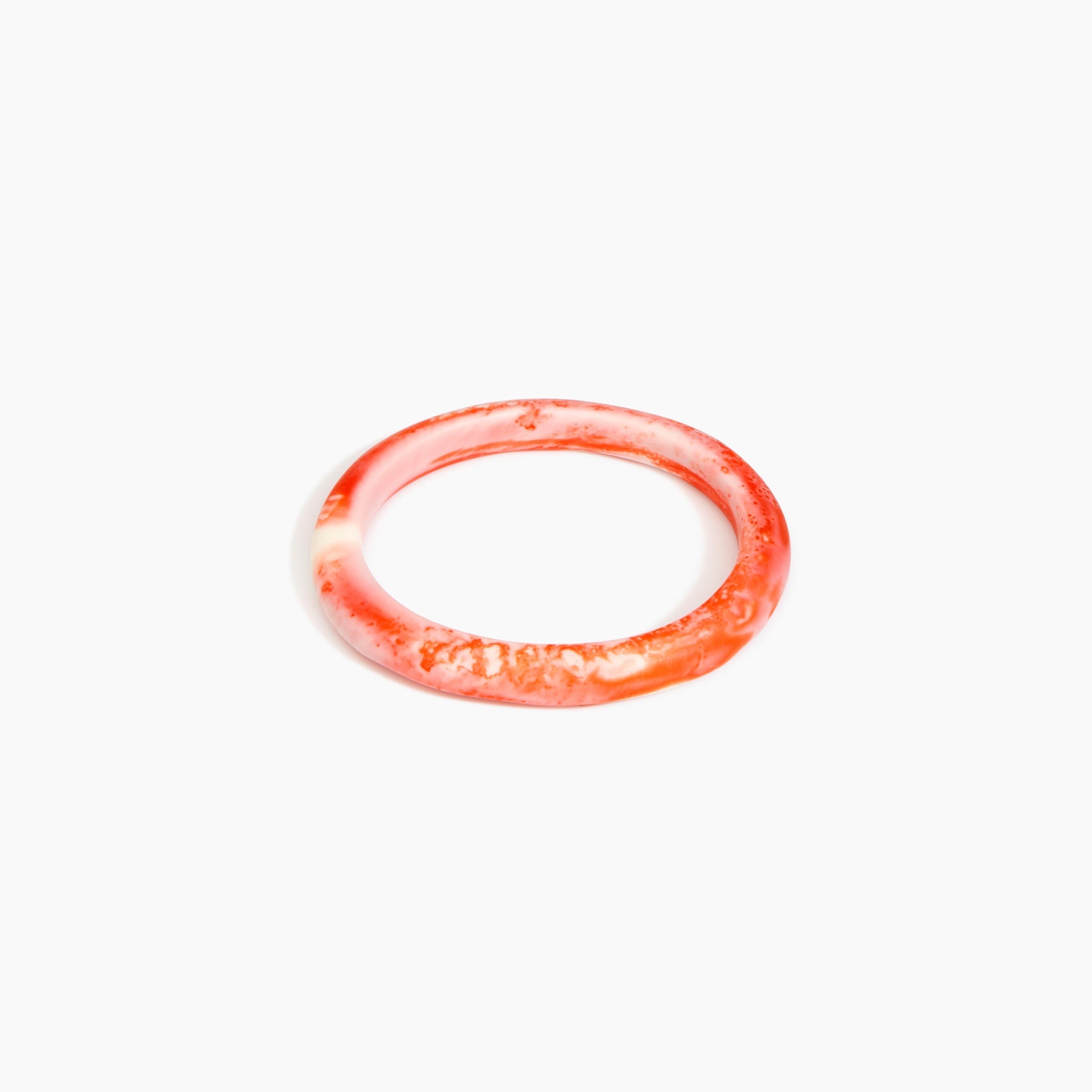 Dinosaur Designs Small Organic Oval Bangle in Strawberry Colour resin with Wide Fit.