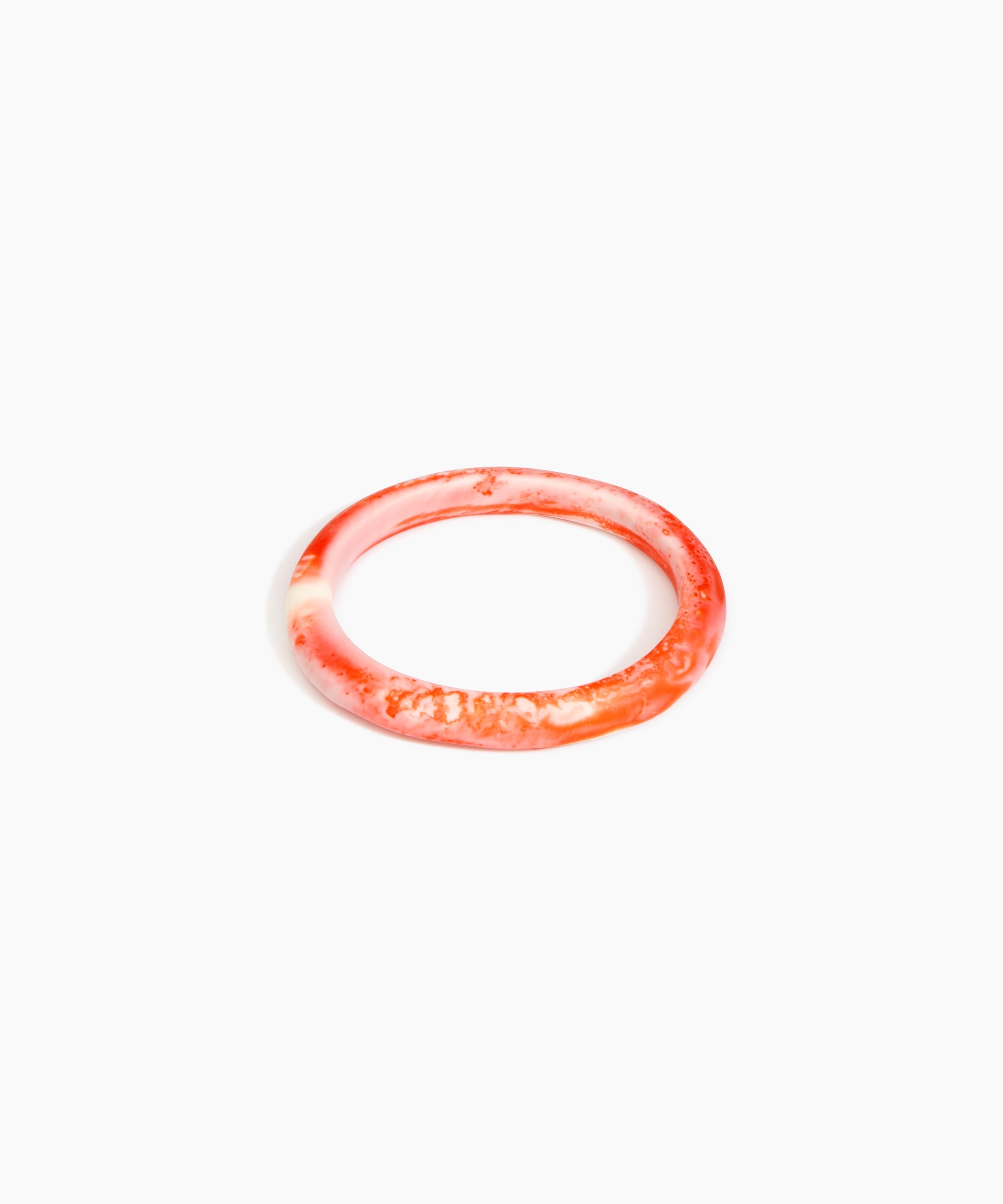 Dinosaur Designs Small Organic Oval Bangle in Strawberry Colour resin with Wide Fit.