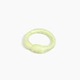 Dinosaur Designs Sprout Bangle in Pistachio — handcrafted marbled pastel green resin bangle with chunky rounded form