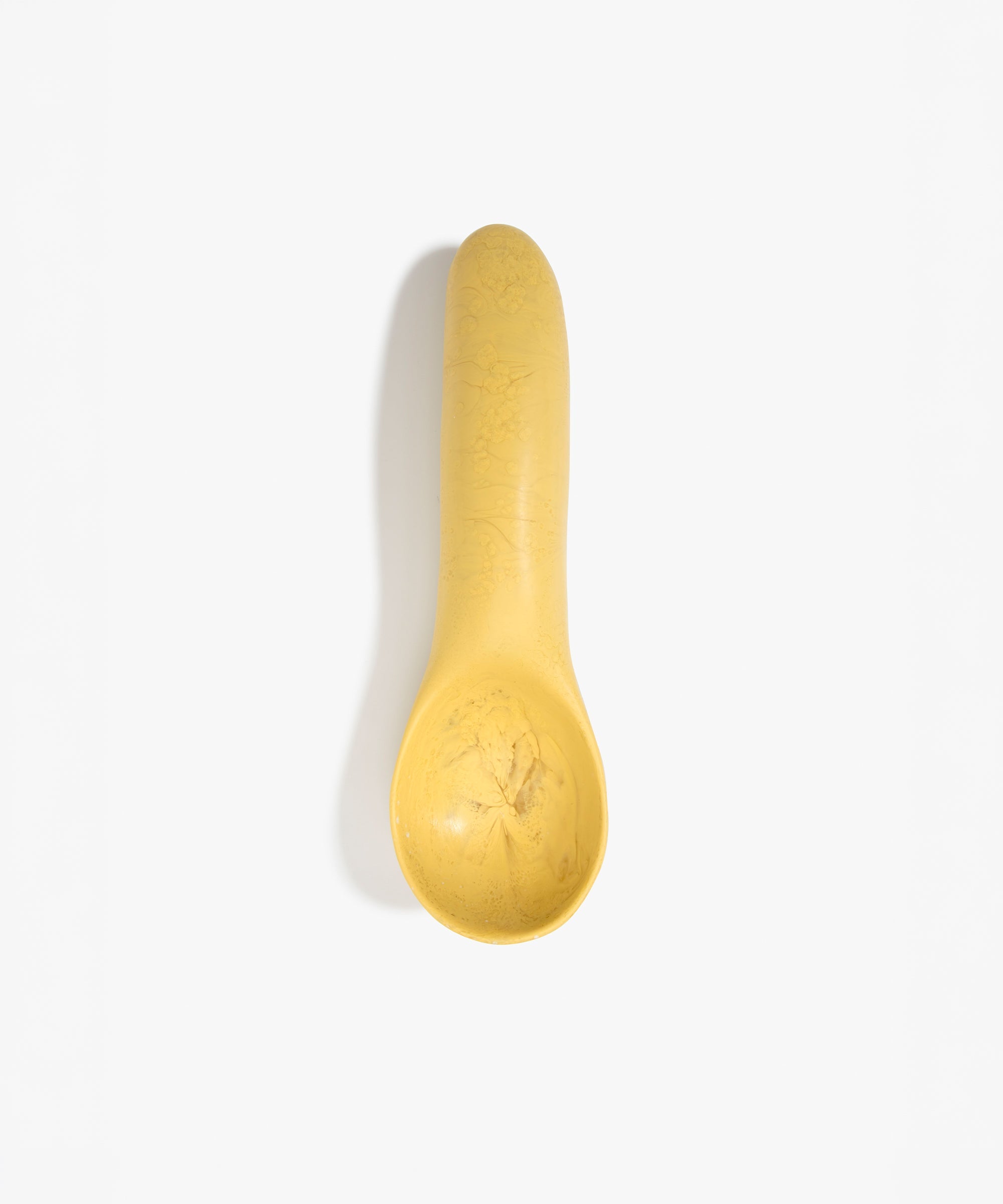 Dinosaur Designs Shell Gelato Scoop in Pollen — handcrafted marbled yellow resin ice cream scoop with deep rounded bowl and smooth cylindrical handle