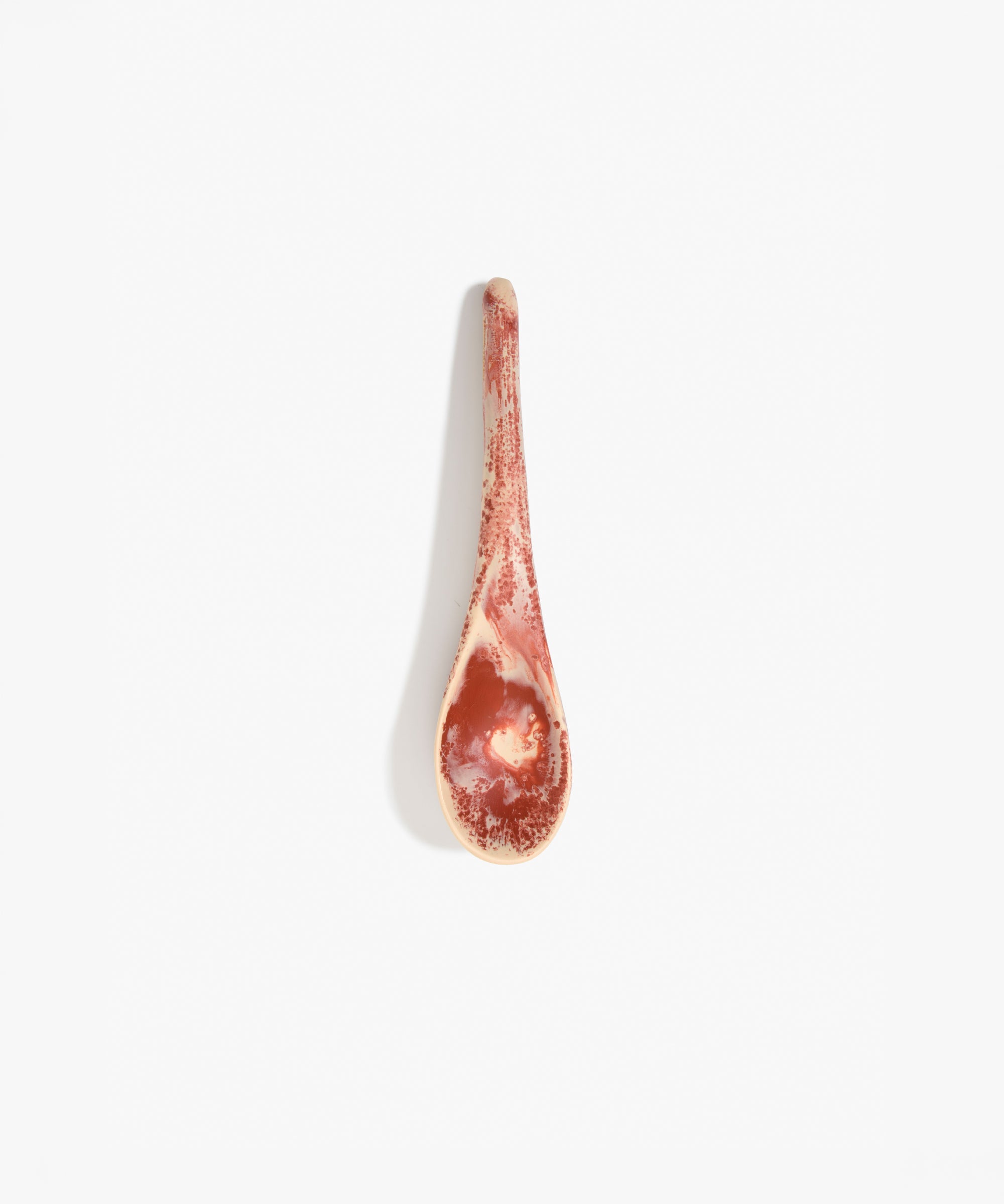 Dinosaur Designs Large Shell Spoon in Rust — handcrafted marbled terracotta red and cream resin spoon with slender tapered handle