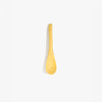 Dinosaur Designs Medium Shell Spoon in Pollen — handcrafted marbled yellow resin spoon with slender tapered handle