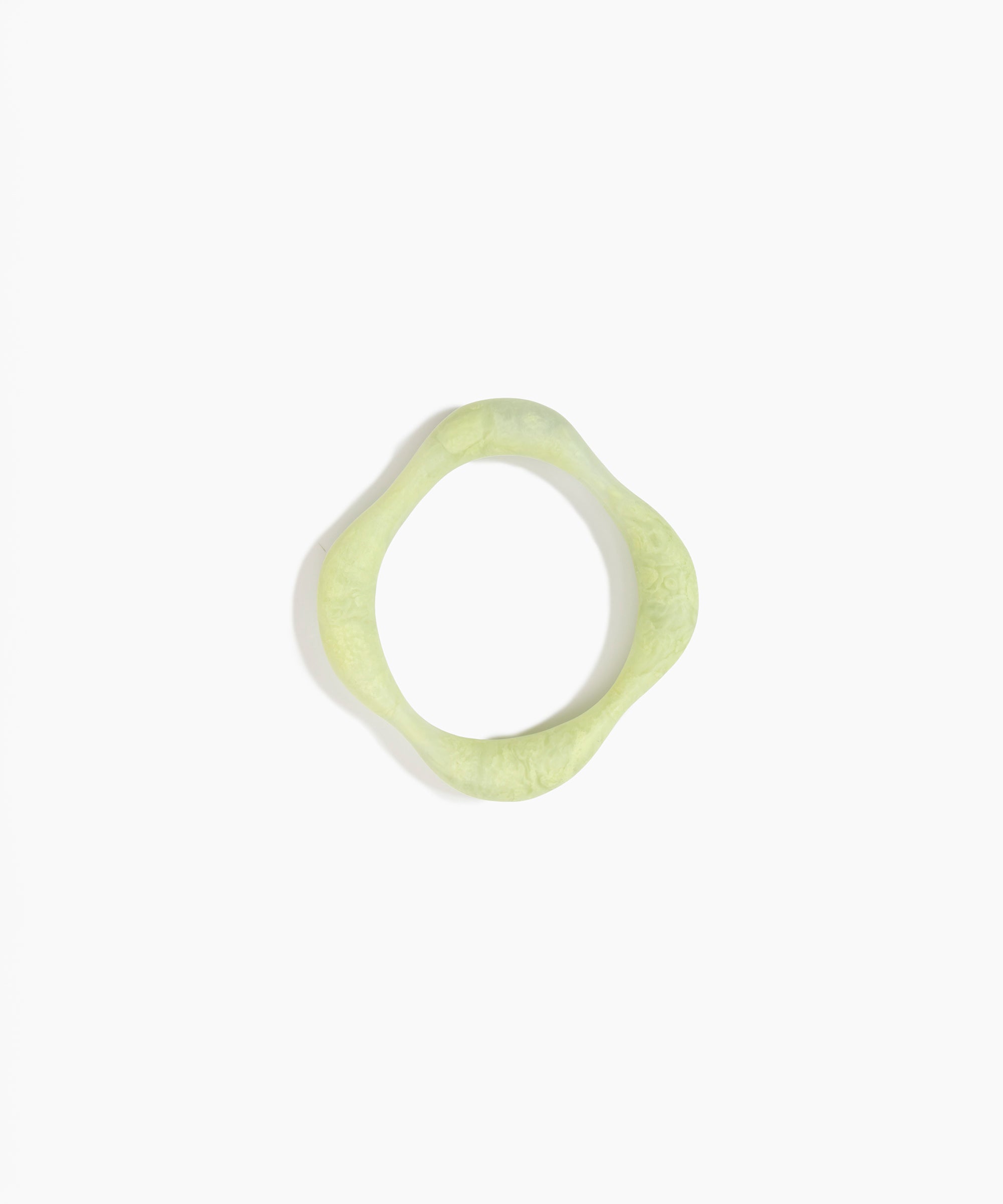Dinosaur Designs Petal Bangle in Pistachio — handmade marbled pastel green resin bangle with slim undulating organic form