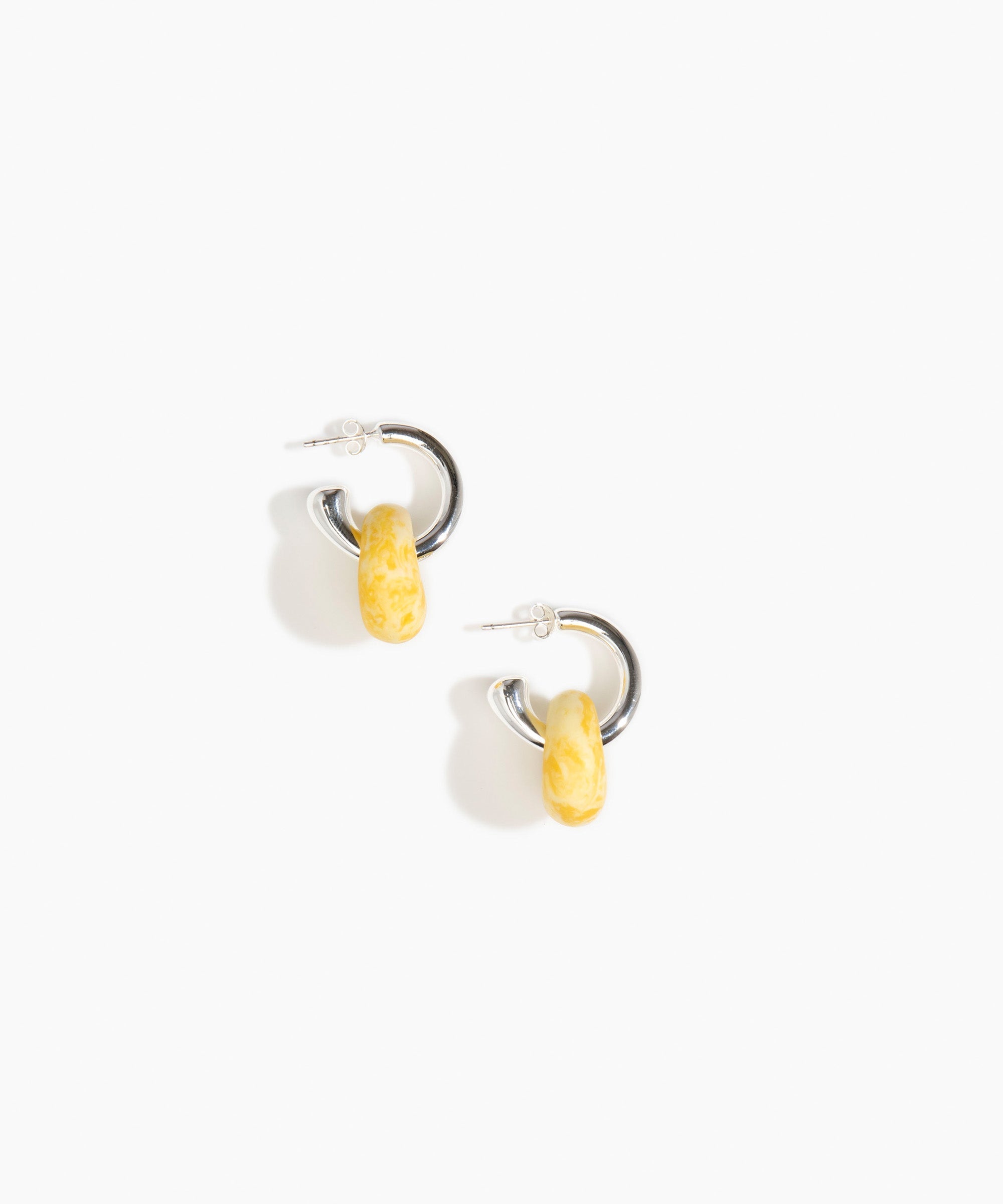 Dinosaur Designs Small Splash Earrings in Daisy Colour resin with Silver-Plated Brass Hoop Material.