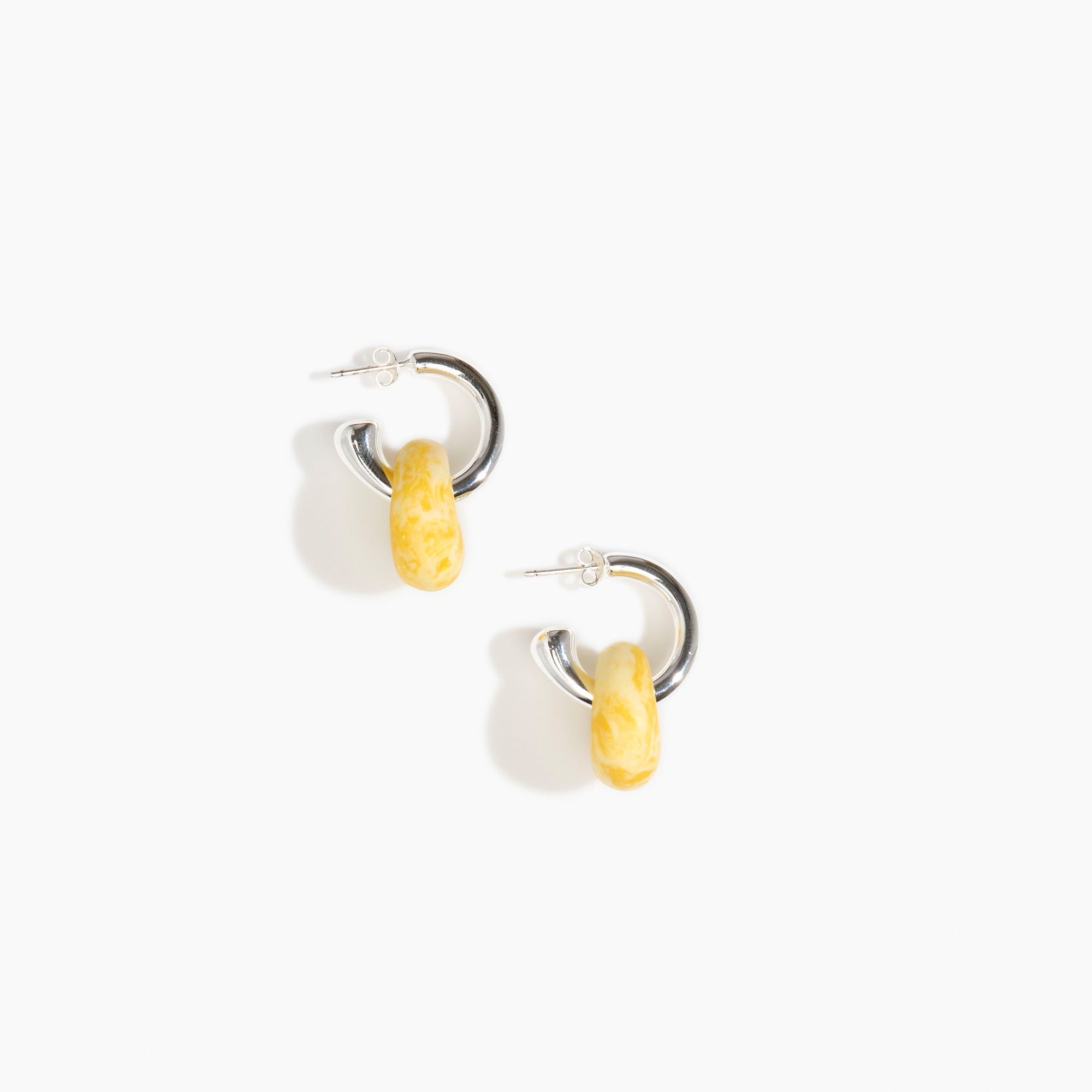 Dinosaur Designs Small Splash Earrings in Daisy Colour resin with Silver-Plated Brass Hoop Material..