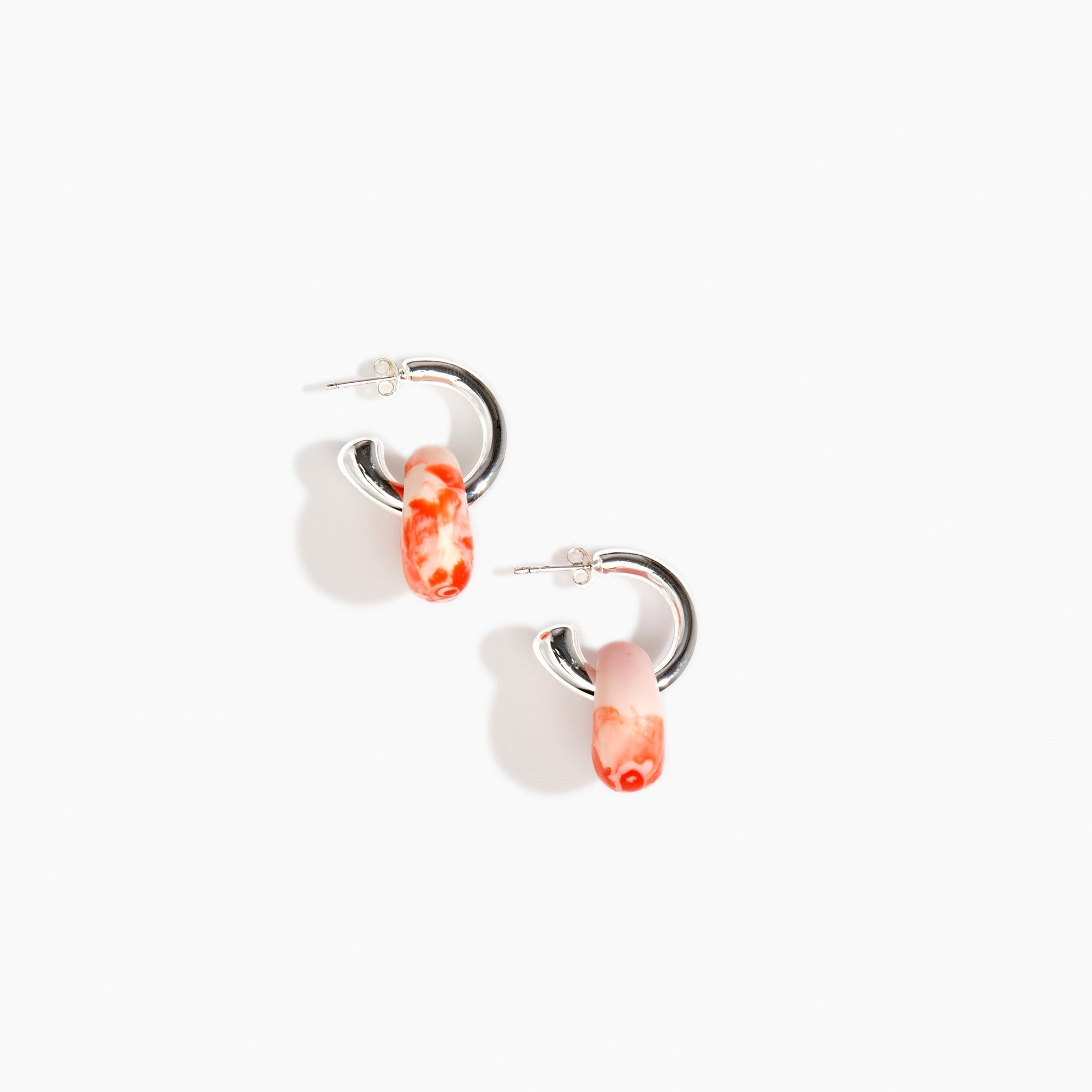 Dinosaur Designs Small Splash Earrings in Strawberry Colour resin with Silver-Plated Brass Hoop Material..