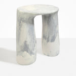 Dinosaur Designs Rock Tower Table in Cloud — handcrafted marbled grey and cream resin side table with oval top and two chunky rounded legs..