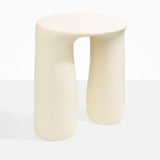 Dinosaur Designs Rock Tower Table in Cream — handcrafted cream resin side table with oval top and two chunky rounded legs..