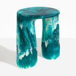 Dinosaur Designs Rock Tower Table in Lagoon — handcrafted marbled blue and cream resin side table with oval top and two chunky rounded legs..