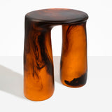 Dinosaur Designs Rock Tower Table in Tortoise — handcrafted marbled amber and black resin side table with oval top and two chunky rounded legs