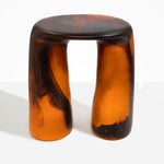 Dinosaur Designs Rock Tower Table in Tortoise — handcrafted marbled amber and black resin side table with oval top and two chunky rounded legs
