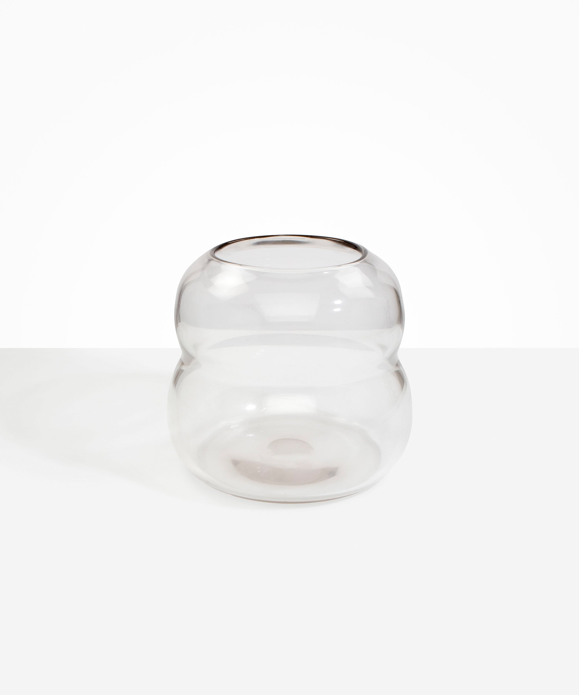 Dinosaur Designs Large Glass Beehive Vase in Clear — handblown transparent glass vase with stacked round silhouette and wide open rim..