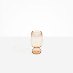 Dinosaur Designs Small Glass Rockpool Vase in Clear Brown — handblown transparent brown glass vase with rounded bulbous body and small spherical pedestal base..