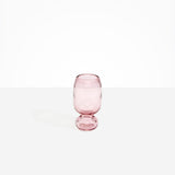 Dinosaur Designs Small Glass Rockpool Vase in Pink — handblown transparent pink glass vase with rounded bulbous body and small spherical pedestal base..