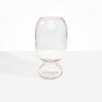 Dinosaur Designs Tall Glass Rockpool Vase in Clear — handblown transparent glass vase with rounded bulbous body and spherical pedestal base..