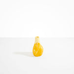 Dinosaur Designs medium sized Liquid vase in daisy yellow colour resin