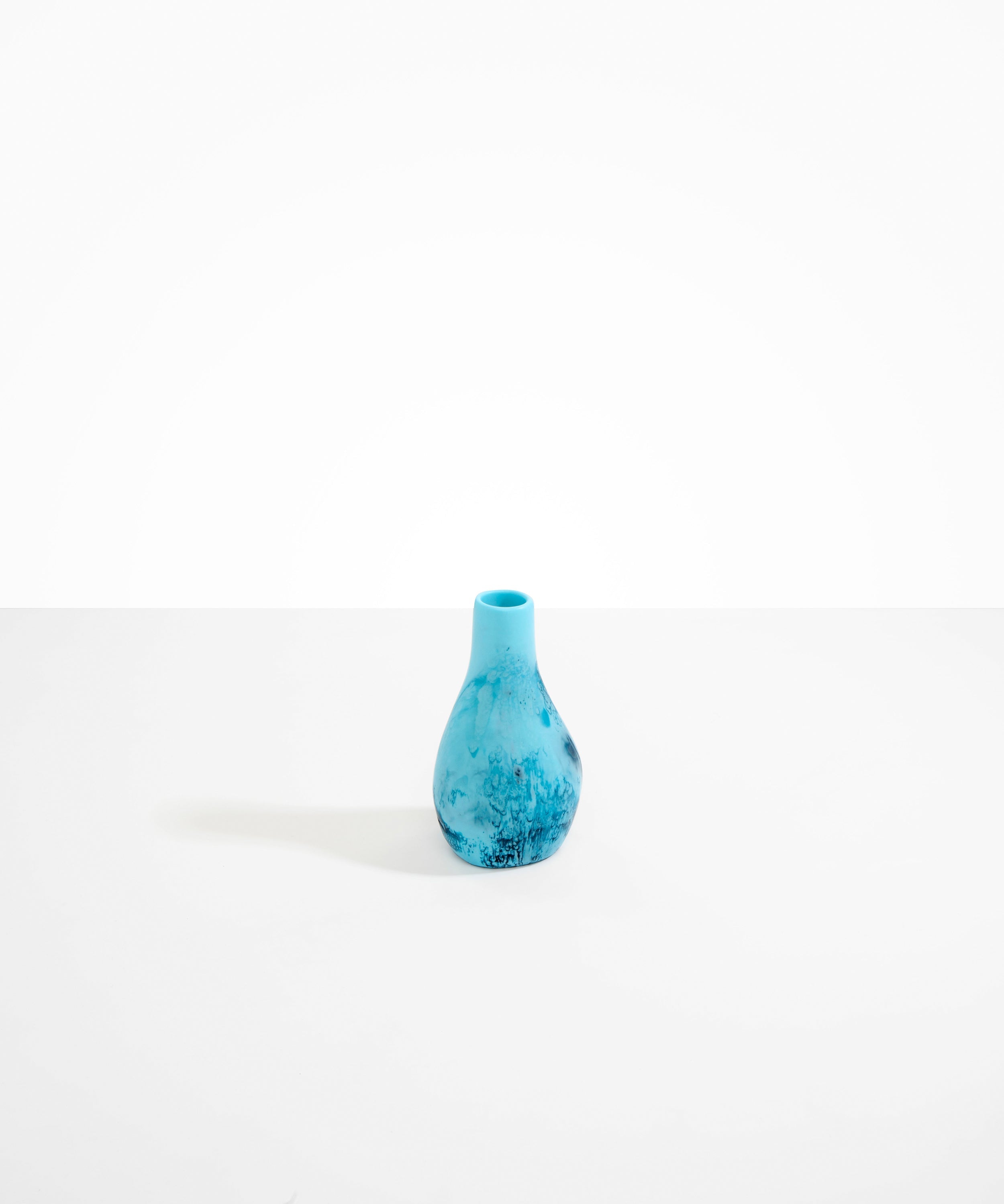 Dinosaur Designs medium sized Liquid vase in water blue colour resin