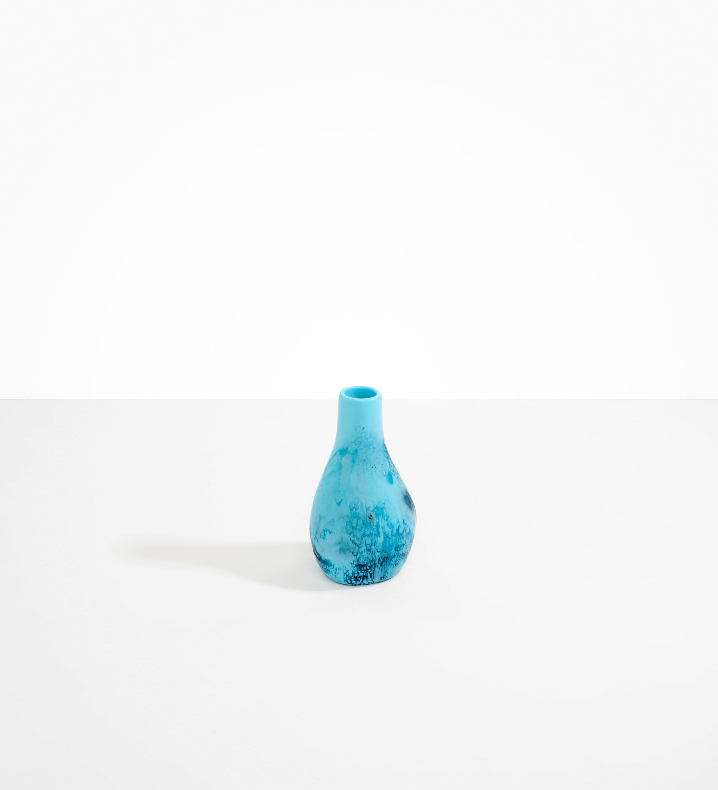 Dinosaur Designs medium sized Liquid vase in water blue colour resin