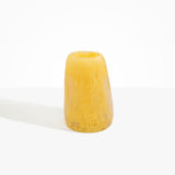 Dinosaur Designs Large Pebble Vase in Pollen — handcrafted marbled yellow and transparent resin vase with smooth rounded pebble form and narrow opening..