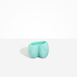 Dinosaur Designs Orchid Vase in Mint — handcrafted marbled mint blue resin vase with short rounded organic form and sculpted open petal-shaped rim