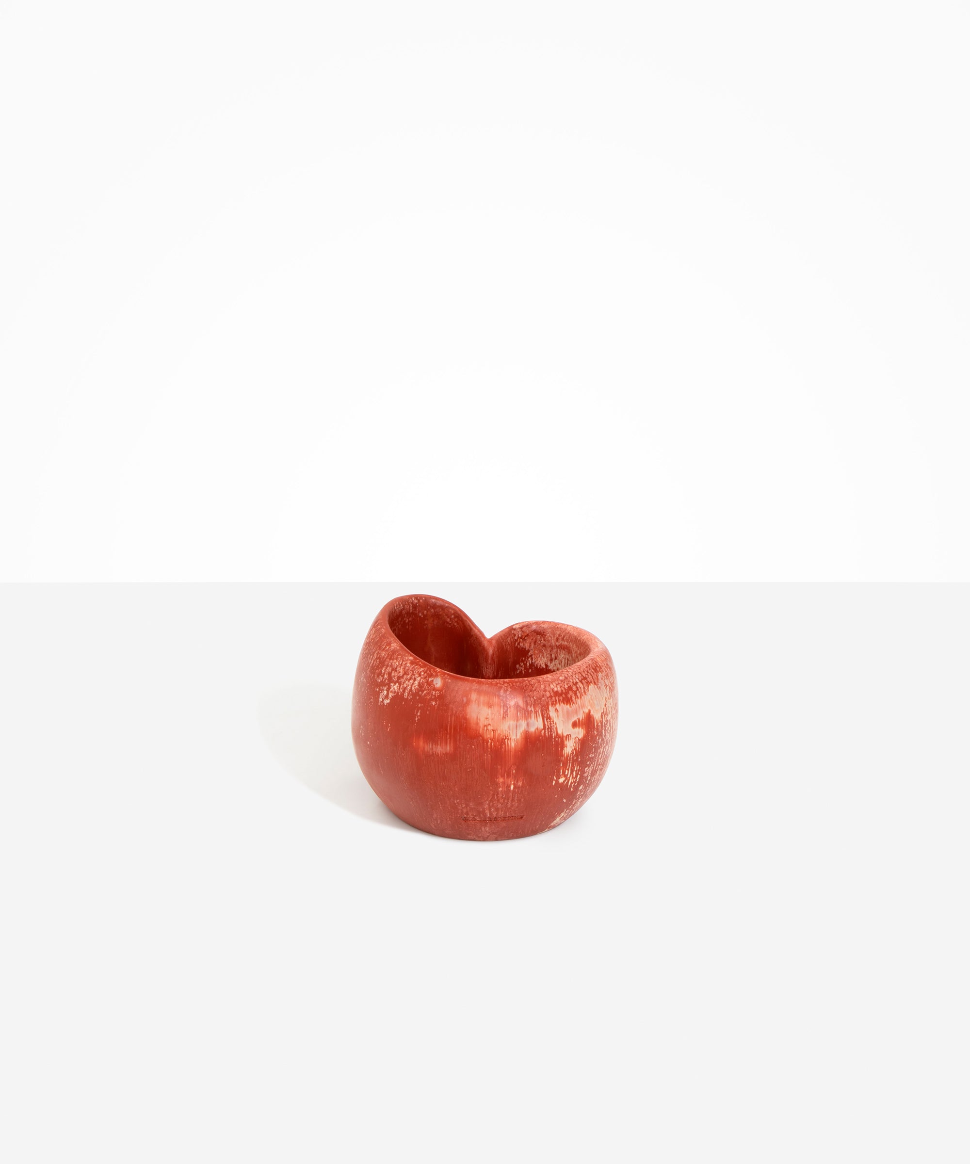 Dinosaur Designs Orchid Vase in Rust — handcrafted marbled terracotta red and cream resin vase with short rounded organic form and sculpted open petal-shaped rim