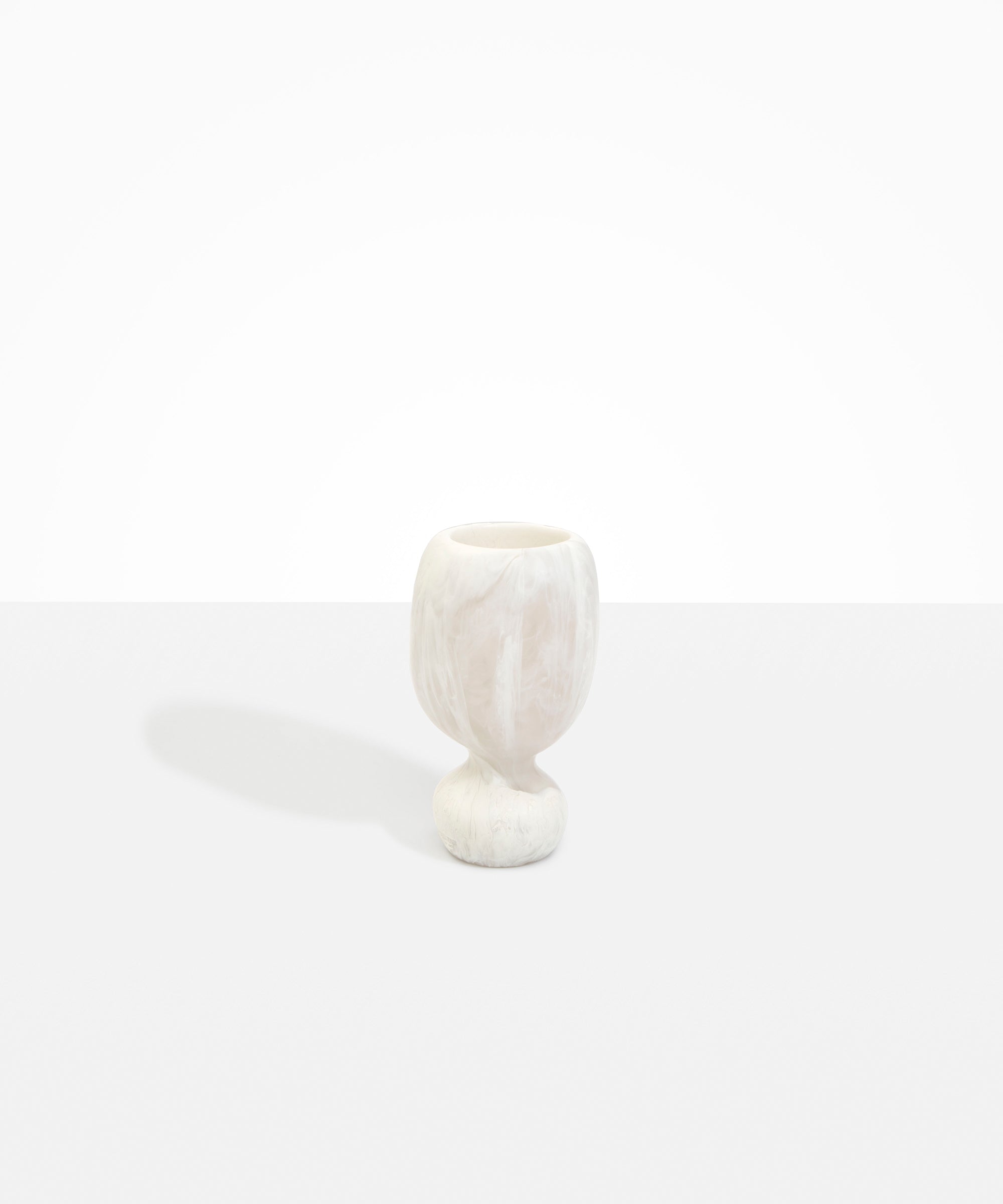 Dinosaur Designs Small Rockpool Vase in Chalk Swirl — handcrafted marbled off-white resin vase with rounded bulbous body and small spherical pedestal base