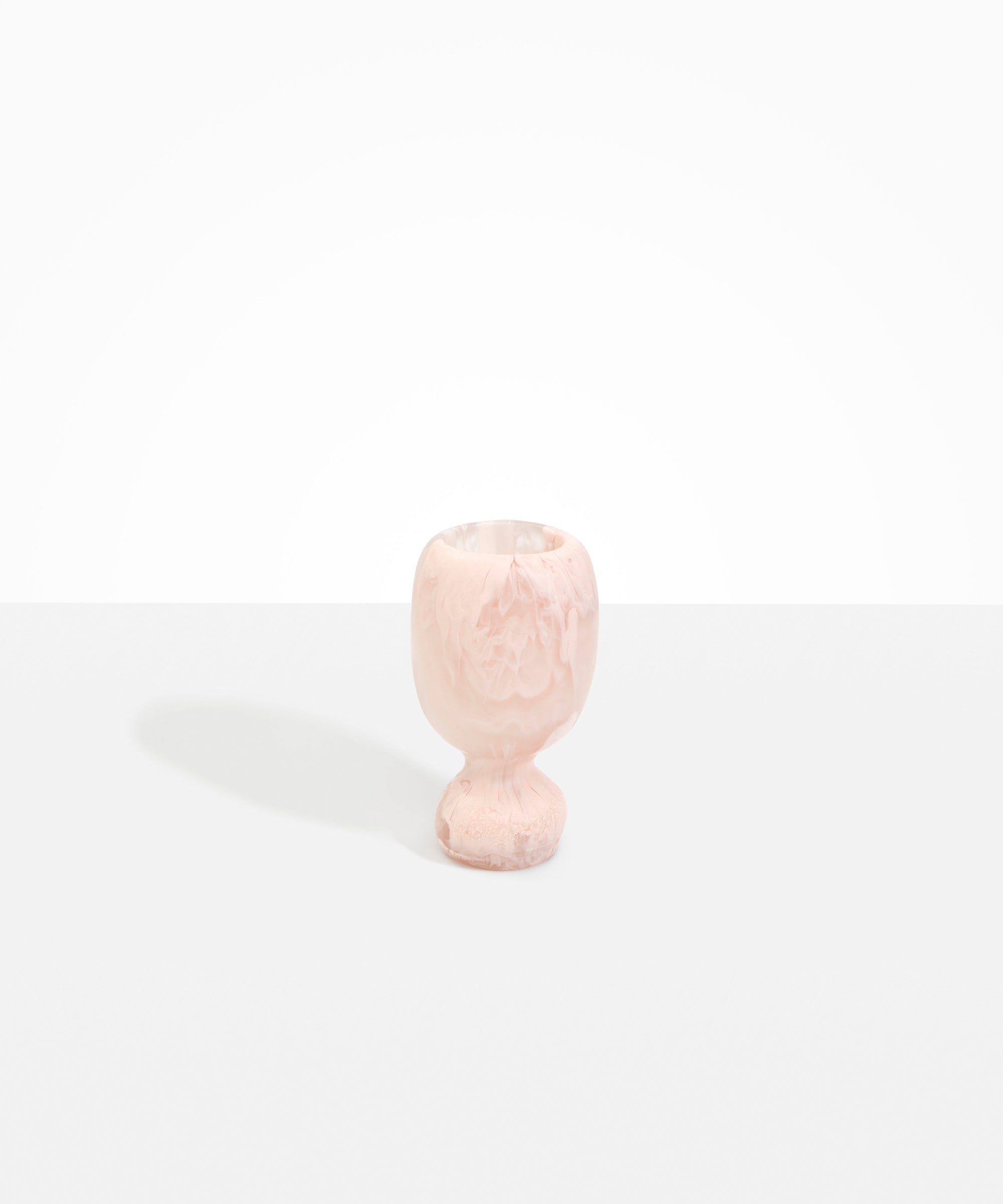 Dinosaur Designs Small Rockpool Vase in Rose Swirl — handcrafted marbled dusty pink resin vase with rounded bulbous body and small spherical pedestal base