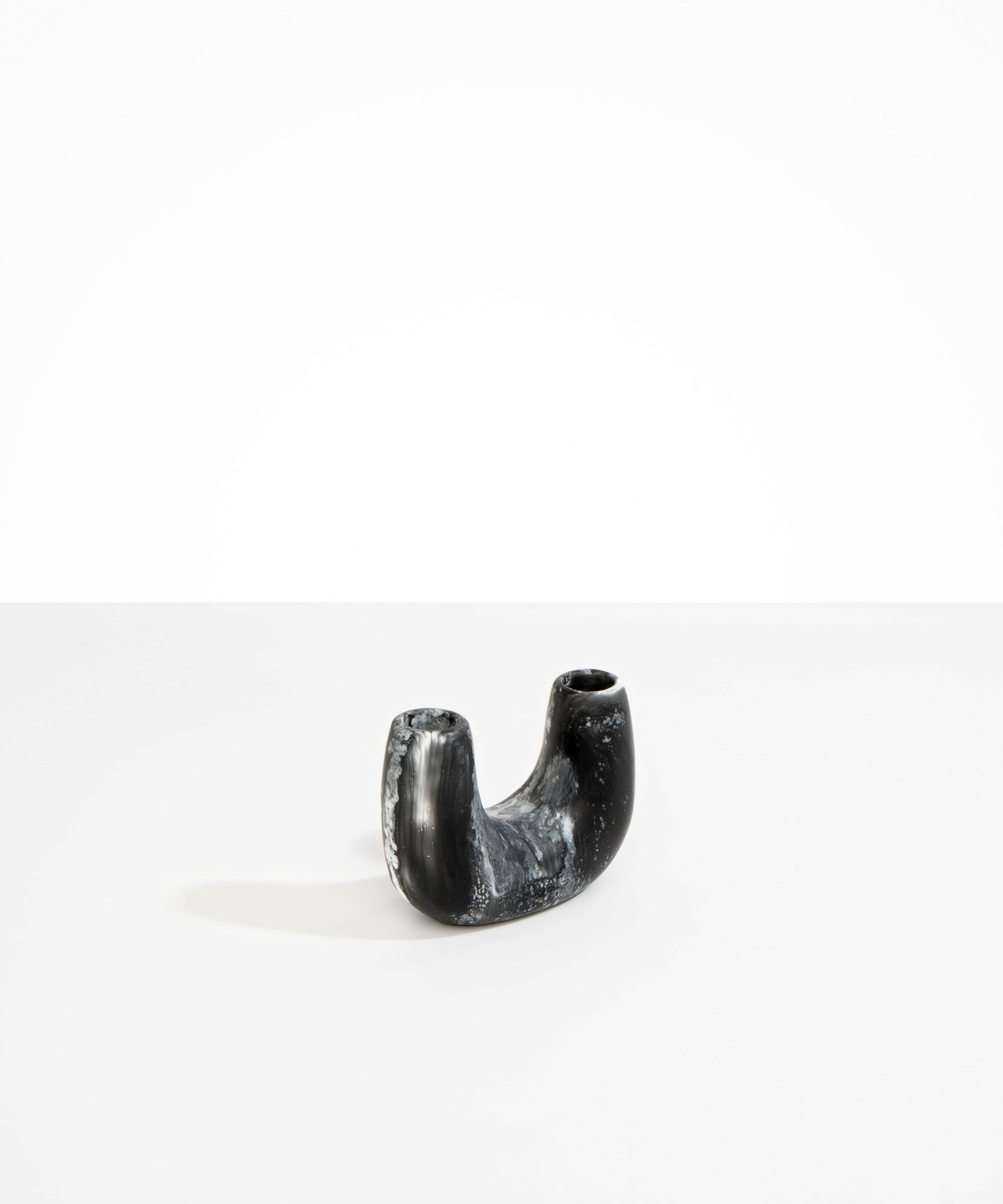 Dinosaur Designs Mini Branch Vase in Black Marble —  marbled black and white resin decorative vase with chunky U-shaped arch form and twin openings