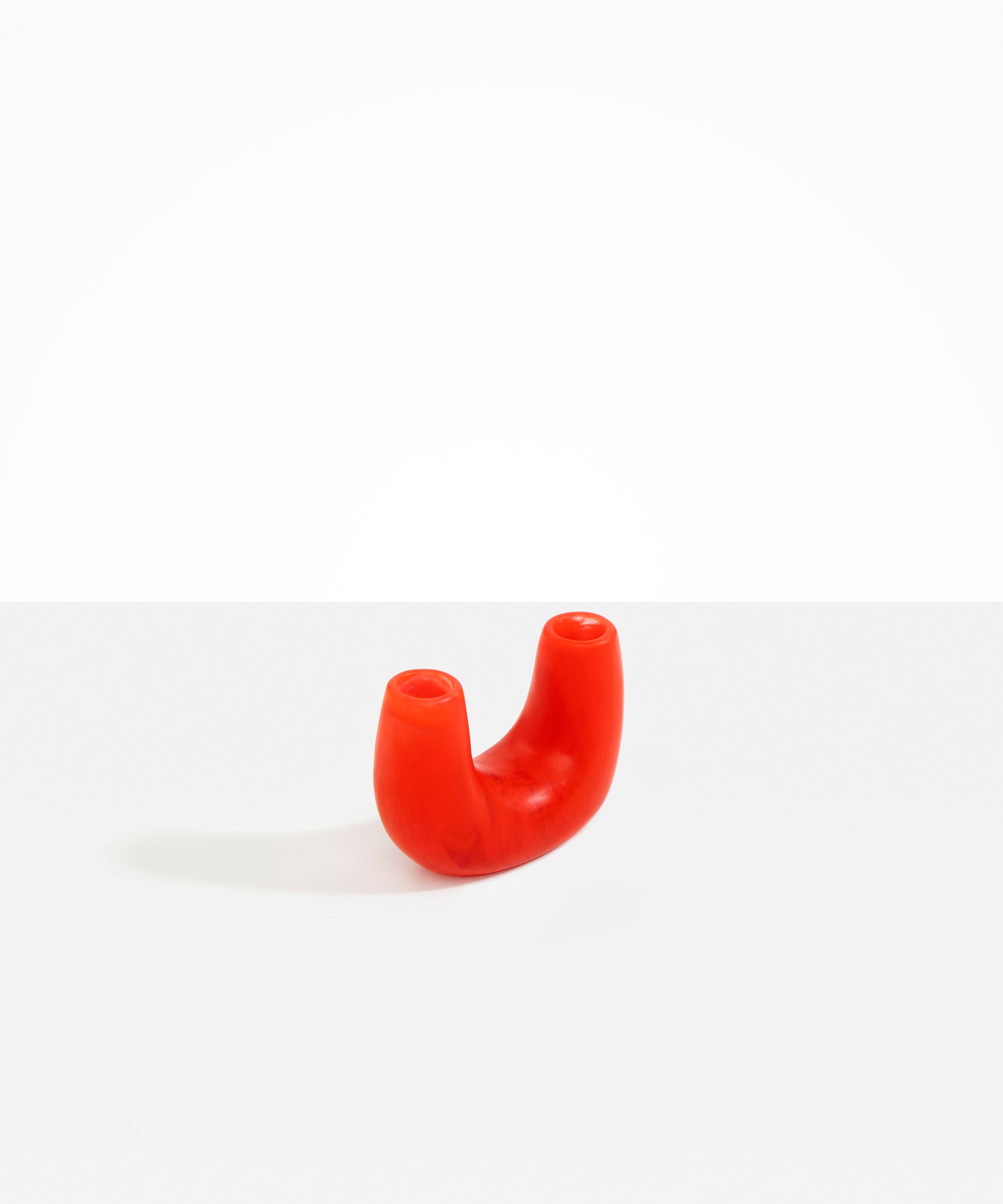 Dinosaur Designs Mini Branch Vase in Poppy —  marbled red resin decorative vase with chunky U-shaped arch form and twin openings