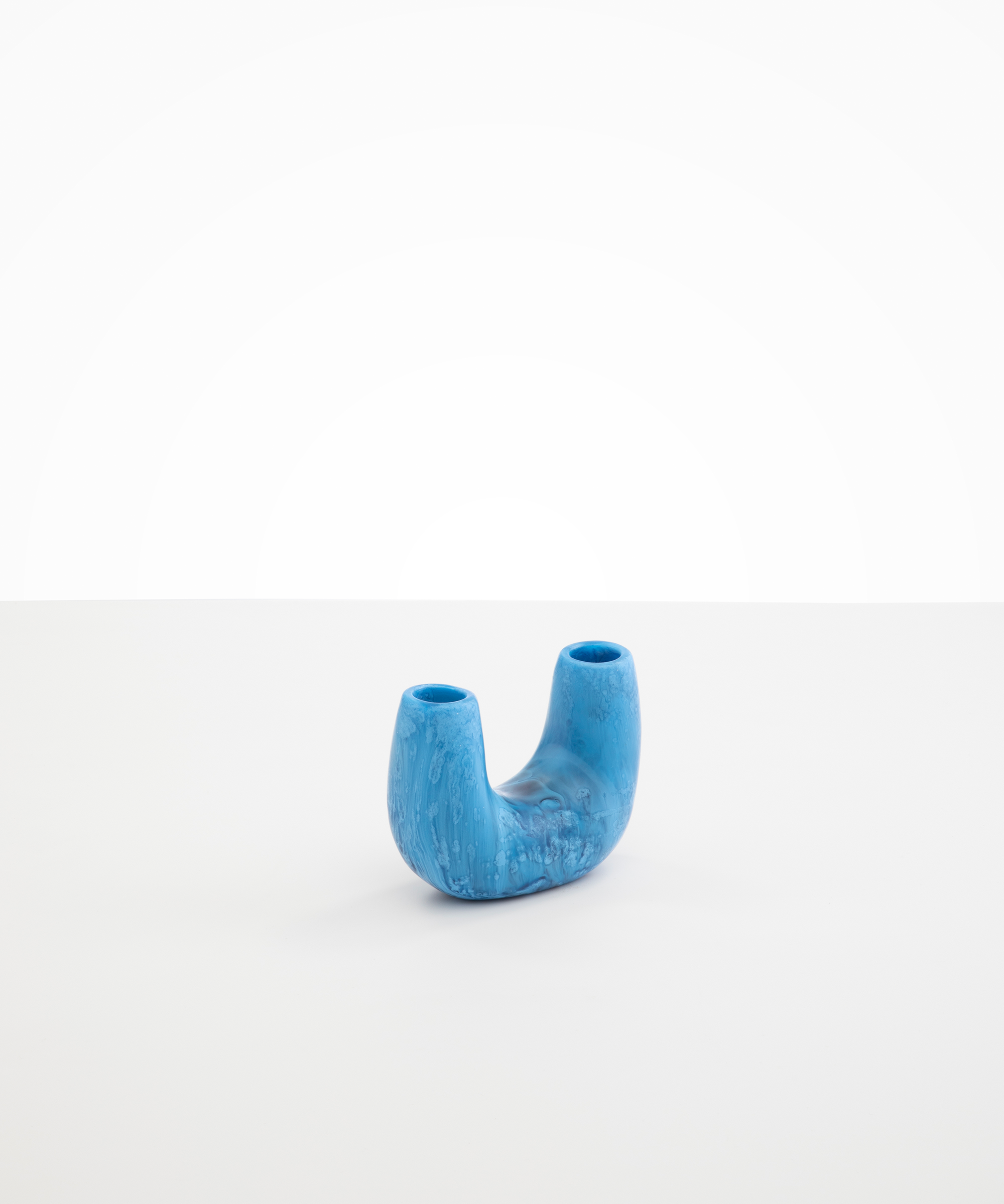 Dinosaur Designs Mini Branch Vase in Sky —  marbled blue resin decorative vase with chunky U-shaped arch form and twin openings