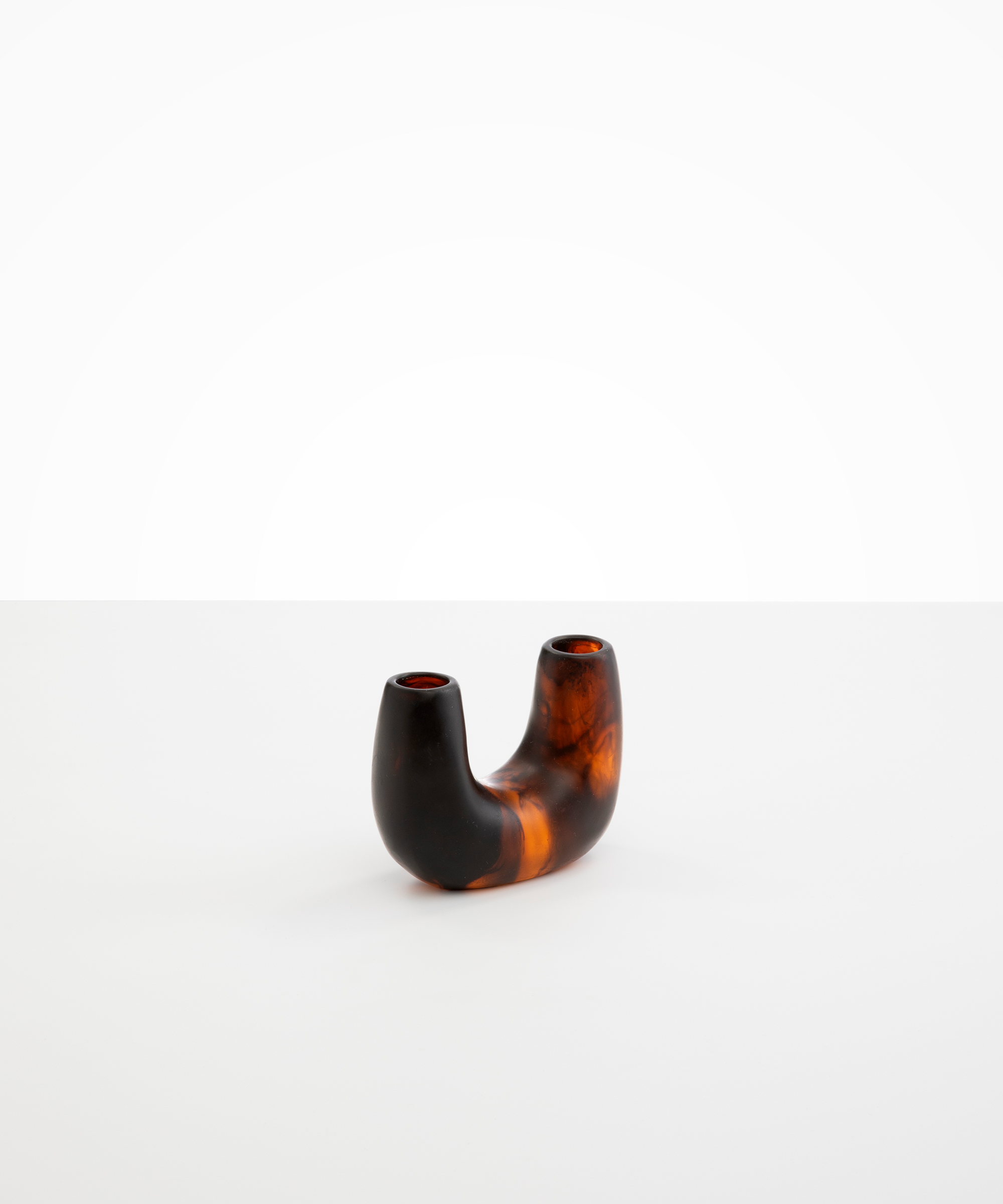 Dinosaur Designs Mini Branch Vase in Tortoise —  marbled black and brown resin decorative vase with chunky U-shaped arch form and twin openings