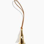 Dinosaur Designs Metal Flower Wind Chime in Brass — polished brass cast flower-shaped decorative wind chime with tan leather hanging loop
