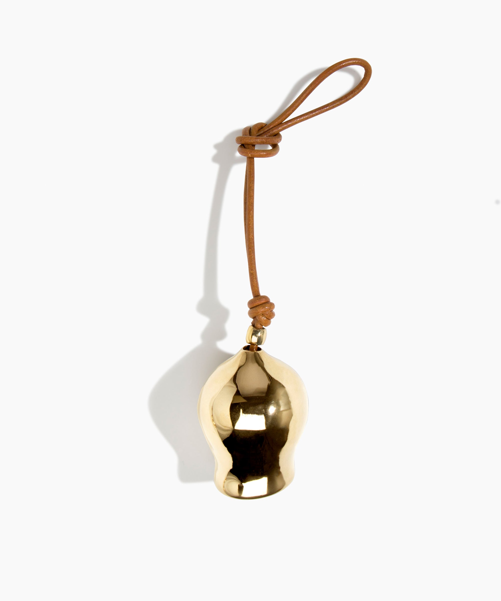 Dinosaur Designs Metal Gumnut Wind Chime in Brass — polished brass cast gumnut-shaped decorative wind chime with tan leather hanging loop