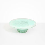 Dinosaur Designs Temple cake stand and plate in mint green colour resin