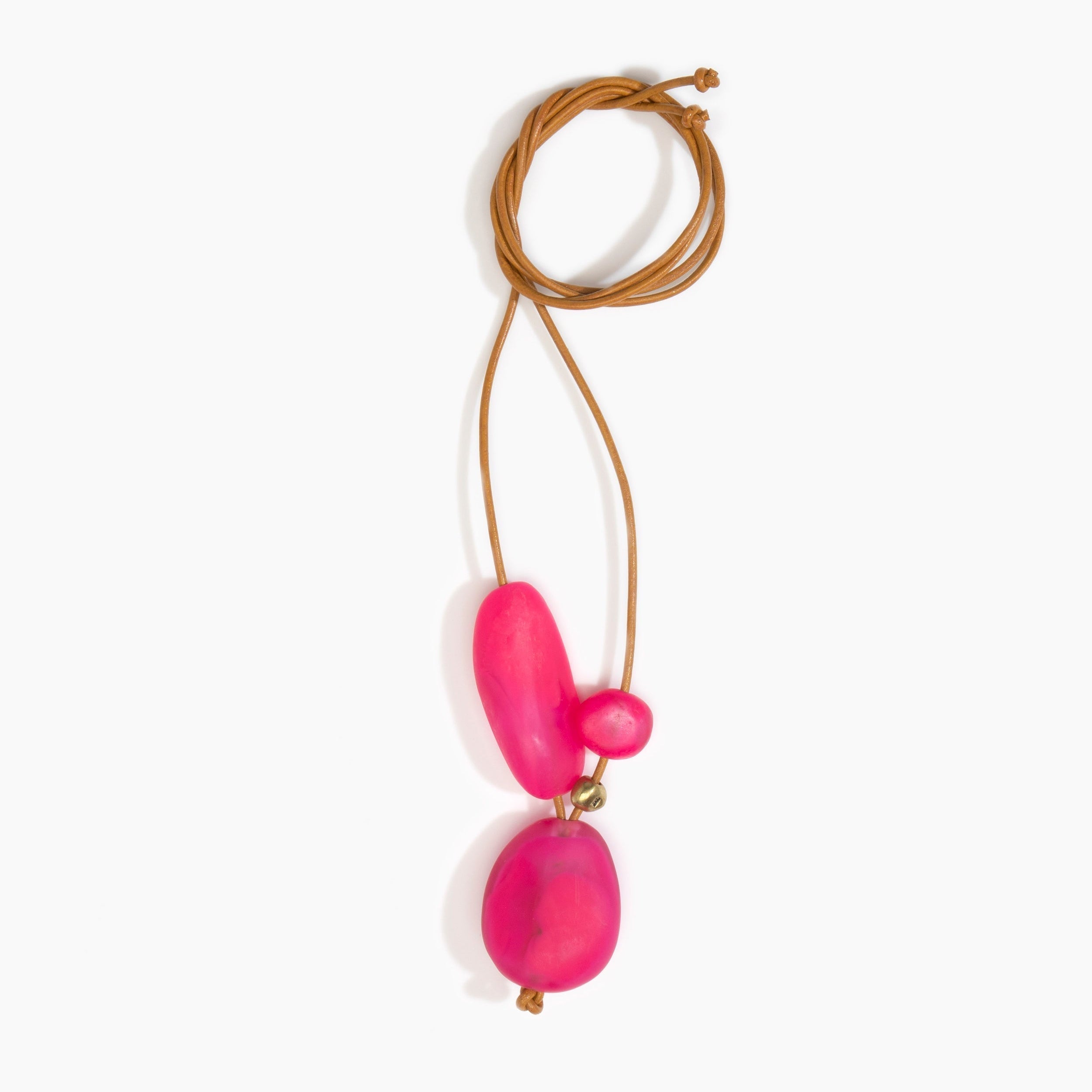 Dinosaur Designs Rock Cluster Pendant in Flamingo Colour resin with Nano-Coated Brass Bead Material.