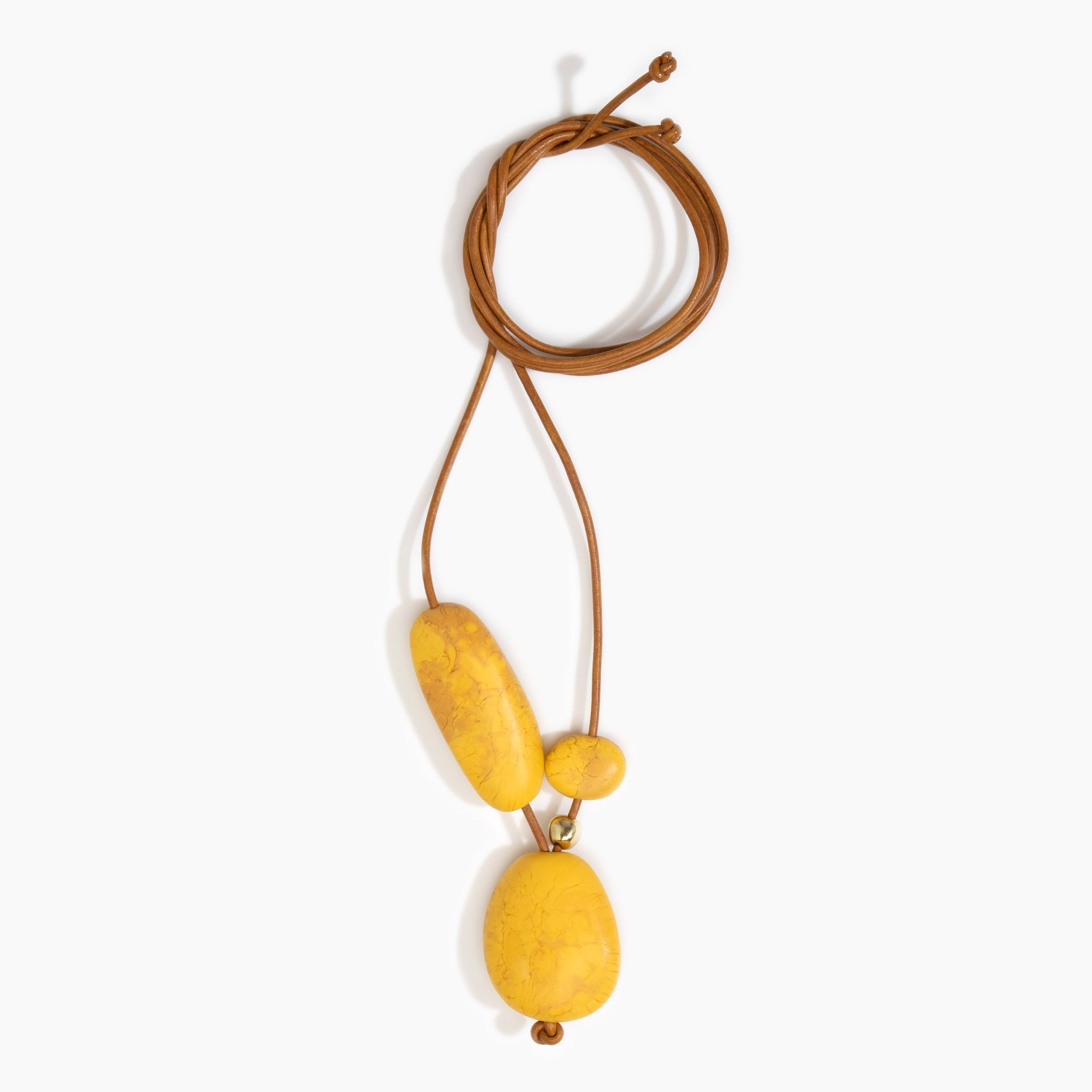 Dinosaur Designs Rock Cluster Pendant in Honeycomb Colour resin with Nano-Coated Brass Bead Material.