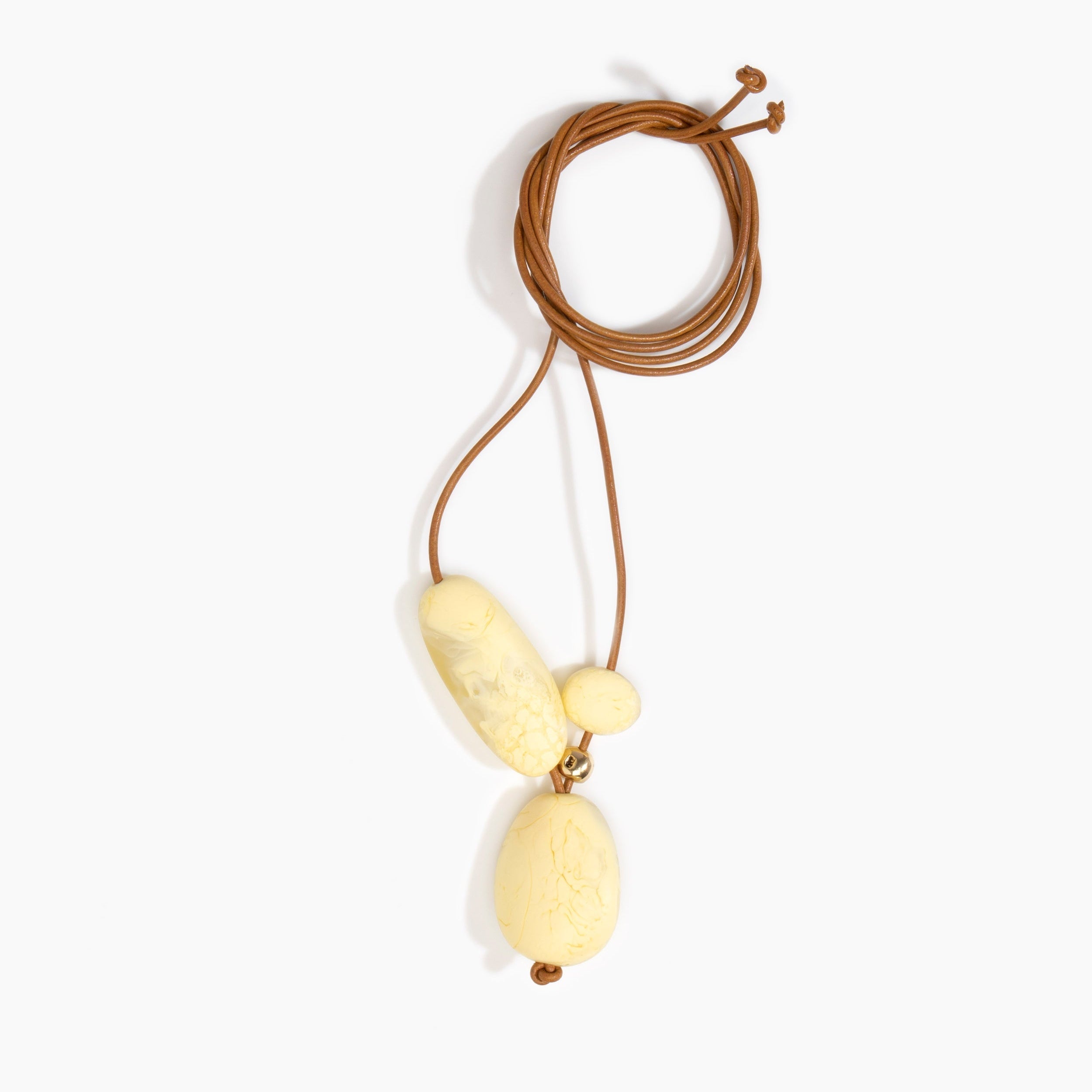Dinosaur Designs Rock Cluster Pendant in Lemon Colour resin with Nano-Coated Brass Bead Material.
