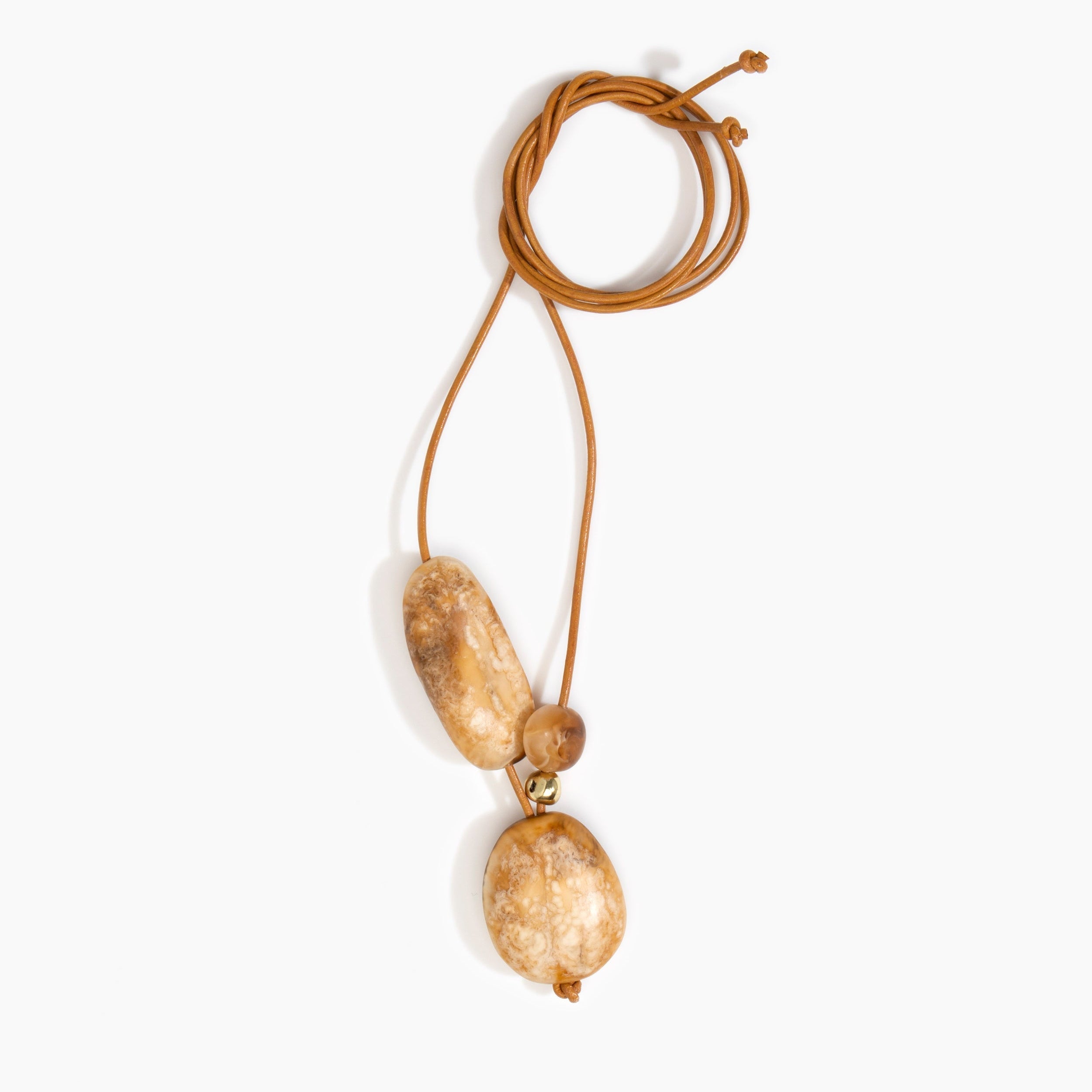 Dinosaur Designs Rock Cluster Pendant in Light Horn Colour resin with Nano-Coated Brass Bead Material.