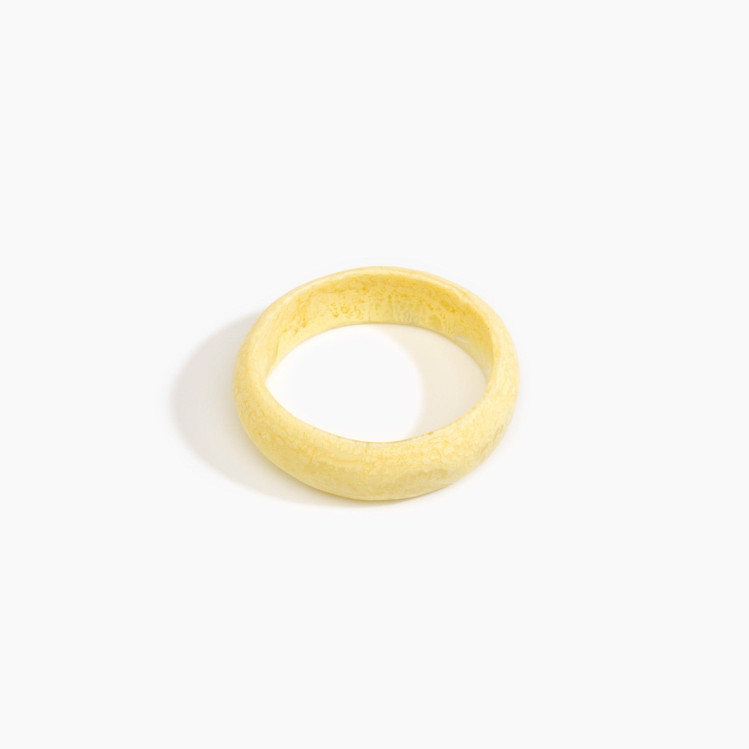 Dinosaur Designs Medium Organic Oval Bangle in Lemon Colour resin with Wide Fit..