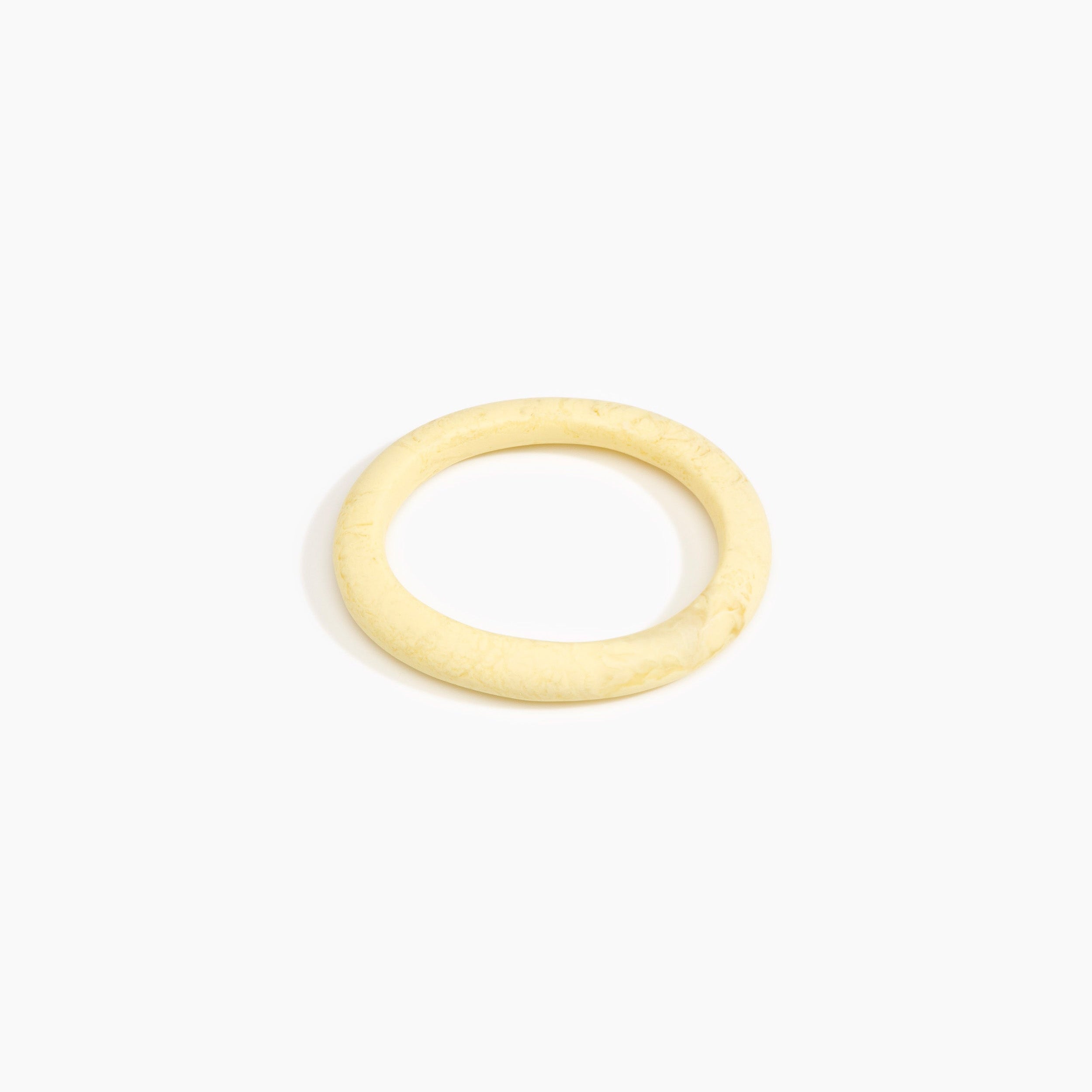 Dinosaur Designs Small Organic Oval Bangle in Lemon Colour resin with Wide Fit.