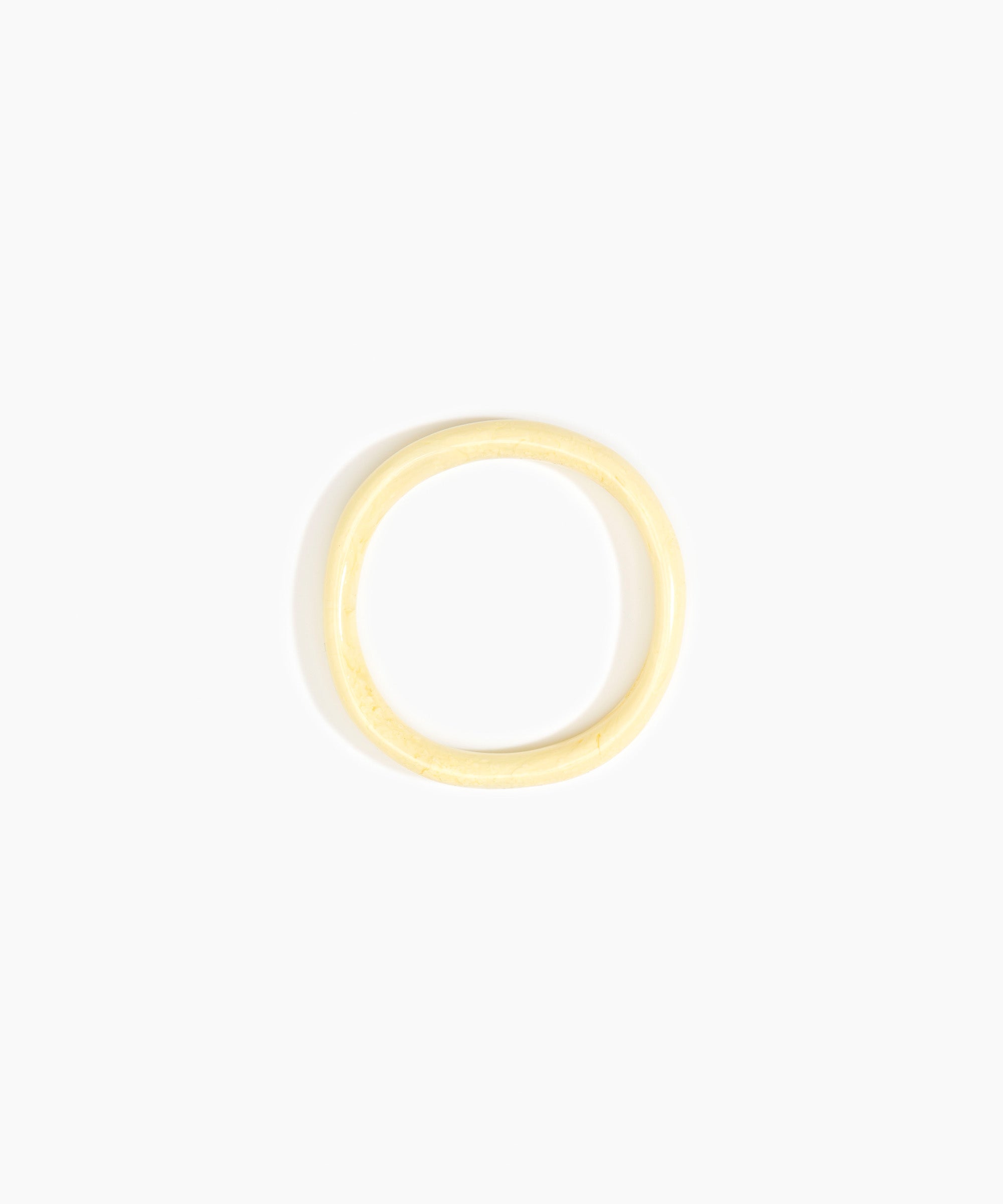 Dinosaur Designs Polished Classic Wishbone Bangle in Lemon Colour resin with Regular Fit.