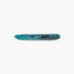 Dinosaur Designs Stone Cheese Knife in Lagoon Colour resin.