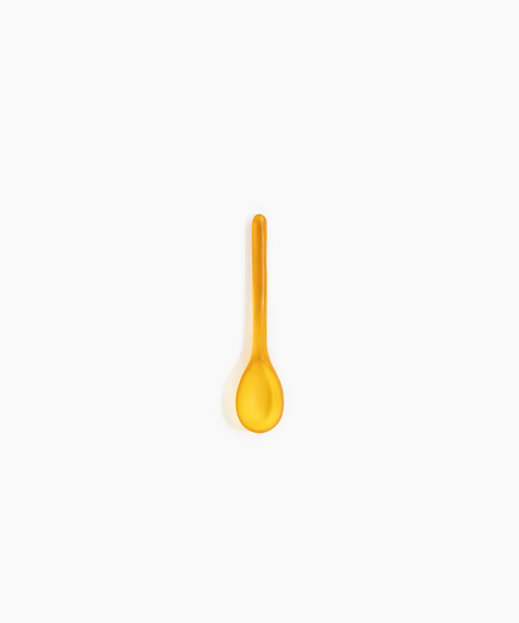 Dinosaur Designs Stone Spoon Tableware in Honey Colour resin..