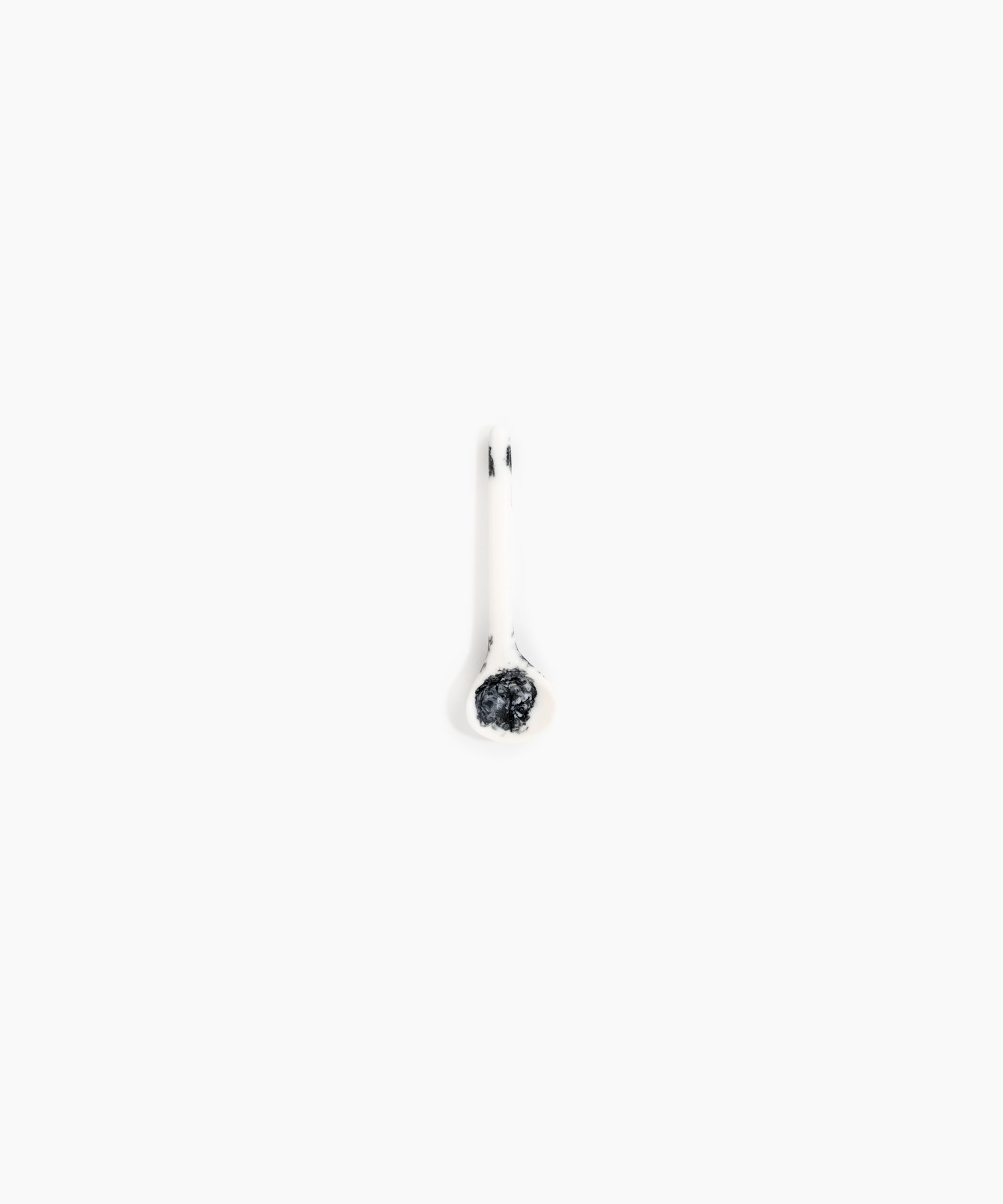 Dinosaur Designs Temple Spoon in White Marble Colour resin.