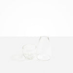 Dinosaur Designs coloured Glass Pebble Carafe cup and jug set in transparent clear.
