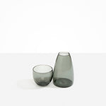 Dinosaur Designs coloured Glass Pebble Carafe cup and jug set in transparent black.