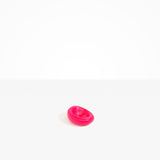 Dinosaur Designs Medium Drift Dish in Cranberry— handcrafted marbled red resin chunky trinket dish with organic form.