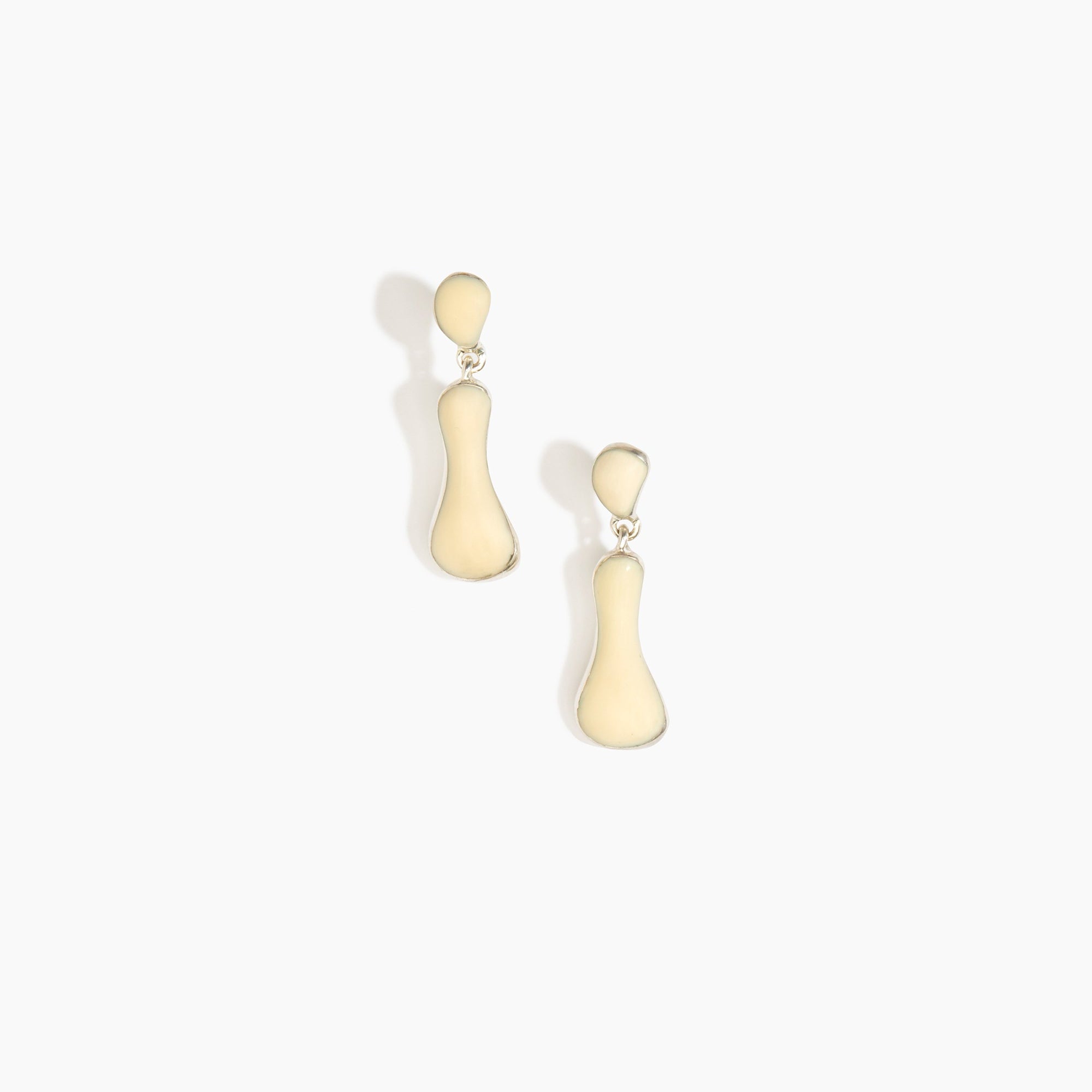 Dinosaur Designs Medium Bones Earrings in Cream Colour resin with Silver-Plated Brass Material.